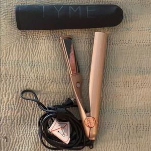 New TYME curling iron. Barely used.